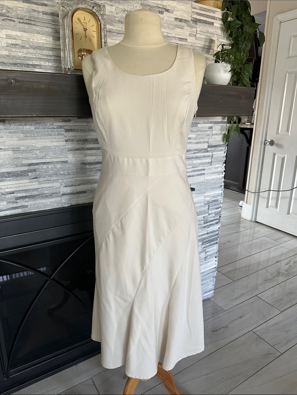 Sleeveless Cream A-Line Dress with Seamed Detail